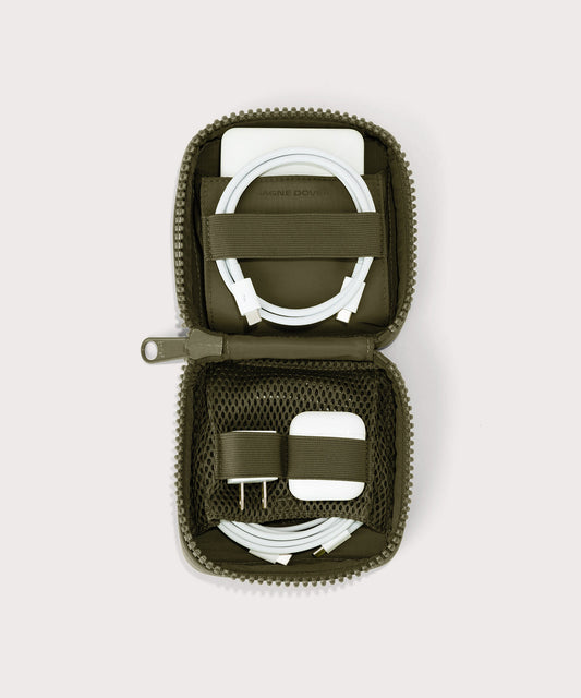 hover - Dagne Dover small Arlo Tech Organizer in dark green unzipped, revealing the interior elastic loops and airmesh pockets.