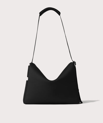 Large Shoulder bag in a black seen from the back view.