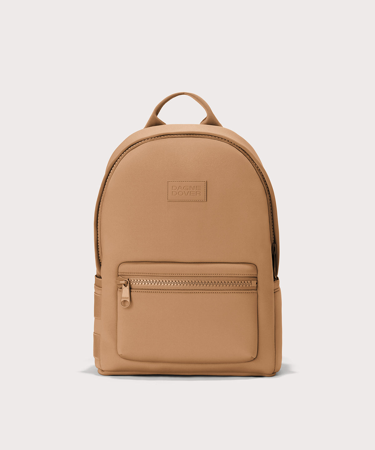 Dagne Dover medium Dakota Neoprene Backpack in camel brown.