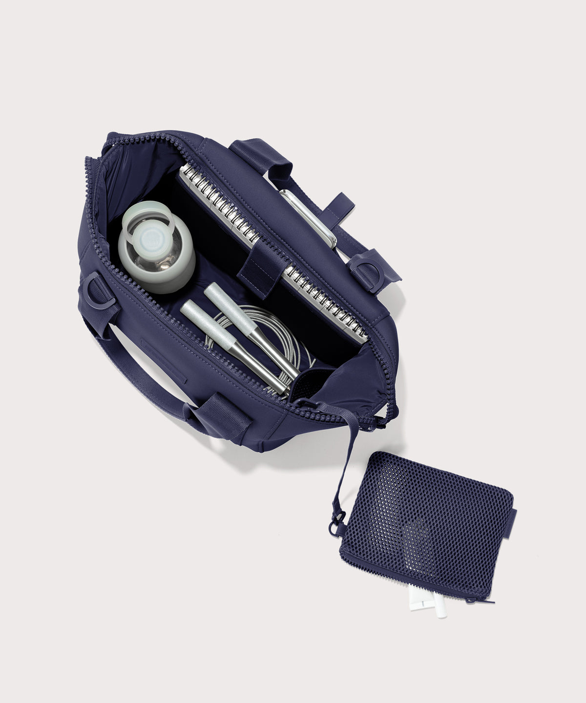 small Landon Carryall in dark blue unzipped, top down view